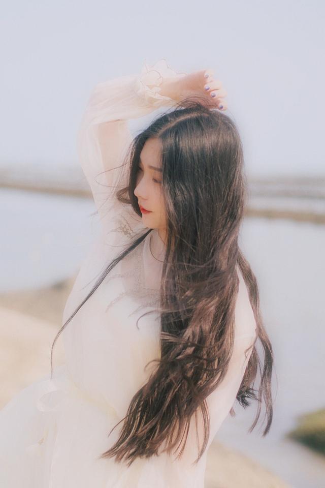 一組海邊舞女寫真，似80年代港星